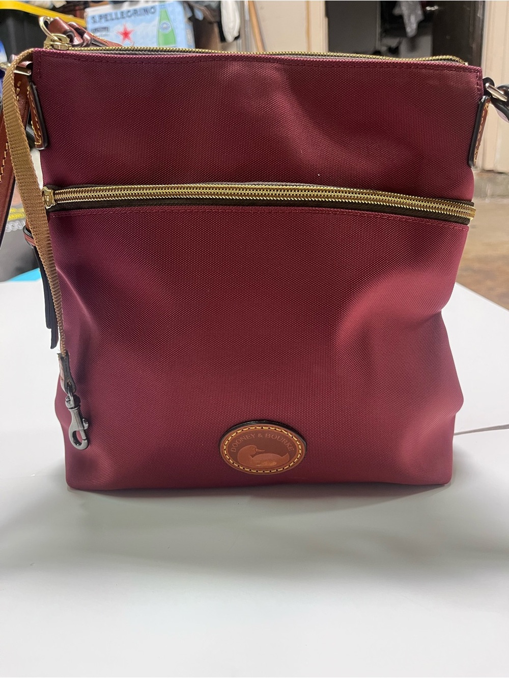 Dooney & Bourke Burgundy Crossbody Messenger Bag with Gold Hardware